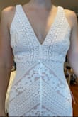 I have a long torso, so usually fitted dresses don't work well for me. This dress is made of a very stretchy fabric, so it actually conforms really well to whatever your body shape is. - Amber K.