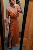 Beautiful dress but if you are large chested this dress is not supportive enough. The straps are adjustable but you just end up looking saggy and it's not possible to wear a bra without it showing. Will be returning. - Olivia K.