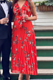 The dress is true to color and at 5'8" it hit the ankles. It does feel a little snug around the waist and bust and fit me fine wearing a small but if you've got a bigger chest a medium works better. From the waist down it's flowy and very flattering. - Jennie R.