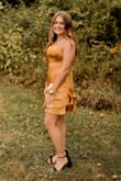 This was a perfect dress for homecoming. Not too short and very nice neckline. The color is a beautiful fall shade of yellow. My daughter was very comfortable in this dress. - Tracy D.