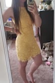 I love this dress and the color is so freaking cute. I will say you have to wear tan or white undergarments because it can be a little see-through. It fits very true to size and looks amazing. It is very comfortable and the color looks just like the picture. I typically wear small in tops and 6-8 in American Eagle jeans. - Kasey H.