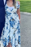 Really cute dress, definitely low cut! Would have liked to have it altered but didn't have time so I just wore with a tank. Super comfortable! - Lauren D.