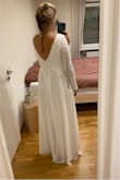 I ordered this dress for my civil wedding in Germany. It's perfect for my winter wedding and it looks exactly like it's shown in the pictures. It was very fast shipping. Only 5 days! The customs duties for shipping to Germany were 32.50 Euro. - Franziska D.