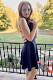 We wound up buying two and this one fit perfectly. We were so happy with the way it looked on her. Beautiful dress and great price. Really appreciated how easy it was returning the dress we didn't go with. - Tracey M.
