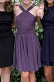 My daughter recently wore this to homecoming and she received so many compliments! Everyone loved the beautiful purple color and the unique neckline. Great dress for the price! - Emily S.