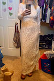 I am getting married in this dress! It's a little long and I am going to take the train off, but otherwise it fits beautifully. It is very comfortable and I love it. - Christine M.