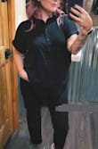 The fabric is amazing as well as the fit. It's more loose fitting, but not too big. I have the black one and it's not see thru. I want to wear this shirt every day! - Emma F.