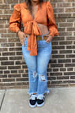I love this top! It's perfect for fall and pairs well with anything high waisted. - Nicole R.