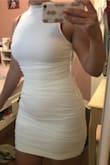 I got this dress for an all white event and honestly so happy I did. I did one purchase to see how the dress would fit, as I've never ordered from Lulus and I'm so impressed with how figure hugging the dress is! It has a panel underneath which helps with it being see through. Although the dress isn't 100% not see through I wouldn't let that discourage you from getting it! All in all it's a super flattering dress and I would recommend for anyone looking for that perfect white dress. The only thing I wish is the neck line wasn't as high because it is a bit scratchy. - Simona T.