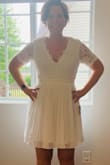This is a very flattering dress! I ordered a size large. It is a little snug, but not enough to size up with the way the top of the dress is cut. - Lauren C.