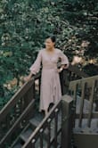 This dress is beautiful. The quality is very nice. The fabric is a bit heavy, perfect for fall. And the back is a very nice surprise. This is modest but sexy. - Gaiz L.
