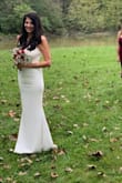 I wore this dress as my wedding dress, I couldn't be more happy with the fit and material.  The dress has stretch and is fully lined.  I would buy it again in a different color. - Theresa D.