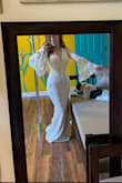 As a curvy girl, I was worried about all the alterations I'd need to get a dress to fit me on the top and bottom, but this one is the perfect solution! Hugs in all the right spots. I bought some sleeves on Etsy to change up the look a little. - Sophie N.