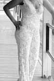 True to size . Very beautiful and elegant for engagement photos. Just had to find the right bra to fit and blend with my skin tone . However I'm very satisfied with this jumper and will wear it again . - Reshanna S.