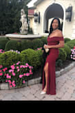 The dress is beautiful. The material was very nice. The dress was a bit long on me and it kept dropping in the front. The slit was the perfect amount open. The color matched the one in the picture. I wore this for a black tie event. - Jocelyne E.