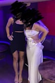 Form fitting but not too tight. Fit the bust well! Really very flattering. - Kasondra H.