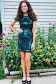 Beautiful dress! It has a flattering fit. It's comfortable and well made. The length is just right. Received many compliments. Shipping was quick as well. - Tracy B.