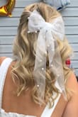 I loved having a plain dress and dressing it up with accessories. This was the perfect "bride" accessory for my shower. - Ashley
