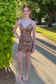 The dress was beautiful and fit true to size. Was worn for homecoming by a high school student. Was a great purchase. - Marissa R.