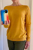 I love everything about this sweater! It's a gorgeous, rich mustard color, lightweight (which I love for fall), and relaxed but not too loose. I often have issues with sleeves being too short on my long arms, but these are just the right length. Can't wait for a chance to wear it out for date night! - Hethyr P.