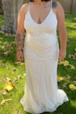 Fits great! If you're 5'3 and below it will be a bit long, but the bottom of the dress was gorgeous! - Kennedy R.