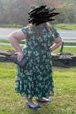 Love this dress all around and got so many compliments. 2X fit well in everywhere except the arms where the sleeves were a little tight. I love the dress so much I bought it in a 3X in black for a looser fit. - Abbie H.