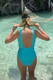 Love this hat! So fun! It is adjustable size! Perfect amount of flop! Great for travel as it rolls up nicely! Enjoy on your next trip to the islands! - Sarah W.