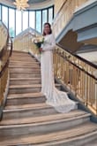 We had an elopement last weekend and everyone loved this dress! I posted to my facebook and instagram and they all love this dress on me. I tried on 3 dresses and this was a last minute change, no alterations needed luckily. I also just used ordinary bra no need for backless or special kind of bra as the strap wont be seen. Must wear high heels shoes though probably 5 inches. Thank you Lulus for this amazing dress and delivered on time. - May A.