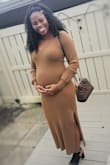 Loved this dress! Wore it to a fall wedding. The medium fit perfect over my growing baby bump! - Asia R.