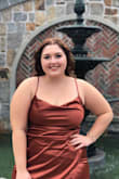 This dress fit me perfectly, I have large hips and it was form fitting and super attractive! The cinched waist added to my hour glass shape too. Definitely recommend for curvier girls like myself. - Kathryn A.