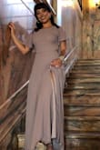 I ordered the XS and definitely had to get the bottom hemmed even with 5 inch heels, but it looked beautiful on and got so many compliments. - Janell M.