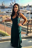 Material is perfect. Not see through (on green dress). It has a liner so that the dress can just hugs all the curves without clinging to skin. It shows just enough cleavage. I received many compliments from many strangers. I wore it to a black tie wedding. I chose green to be just a little different. Depending on the lighting the Forest Green can have a marine blue tone to it (mainly in sunlight). I had to get it hemmed because I'm 5'3". I would also recommend getting a bustle hook on it as the bottom has a train. When I got it hemmed, she did the front only. She talked me into keeping the train. I just wish I would have had her make a bustle for it. Fortunately my mom can sew and she sewed two hook and eye bustles
as best she could quickly for me. The liner would need the bustle too. But the dress was a show stopper for sure (husband and all). - Nicole C.