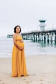 I always purchase from Lulus- for reference, I'm usually 5' 7'' 120 LBS and wear an XS. I purchased this at 37 weeks pregnant with the measurements above and it fit like a glove. Great fit on the bust (wore pasties) and loved how it draped. - Naomi A.