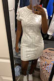 I'm wearing this for my wedding rehearsal dinner & I'm in love!!! I sized up and the dress isn't too stretchy so really glad I did - Faith C.