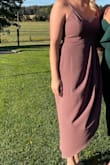 Material is comfortable and color is as expected. Several compliments. Love that the straps are adjustable, works perfect with a strapless bra. The leg slit does go all the way up, so be cautious in the wind! - Gabriel G.