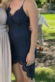 Originally ordered a medium but it was way too big around the hips and butt, returned for a small and fit well. Love that the straps are adjustable to make it more secure. Lace is beautiful! Cannot wear a strapless bra as the back is too low. Leg slit is also very high, be cautious when sitting. - Emily G.
