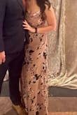 Wore this for a fall wedding and it was beautiful. I am tall so it was the perfect length for me and also being 4 mos postpartum was a flattering fit and pattern helps hide "problem" tummy area. Top was a bit tight but also dealing with breastfeeding boob changes, only reason for 4 instead of 5 stars. - Kelsie F.