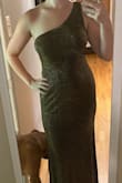 I love this dress! After trying on countless dresses, this one hits the mark for a black tie wedding guest dress. The dress skims over my body, the one shoulder is perfect, and the material is lightweight. The pictures make this dress seems silvery, it is not! In person, this dress is definitely black and gold. I do think this dress runs long (high heels should make it work) and the material will snag easily. But I still think it's worth it! - Liz T.