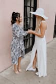 I wore this dress in Charleston for bachelorette Sunday brunch. I felt beautiful and feminine! I wore them with a pair of white chuck taylor to dress it down. 

You could also we're it as your wedding dress, it was so beautiful!! - Rebekah B.