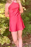 The dress fit well through the chest and waist. It was short and because of the color and material, she wasn't able to wear shorts underneath. - Meggan S.