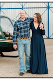 This dress feels so lush & the material is heavier than I expected - which I loved!
It is a bit long, even when wearing heels, but nothing major.
It was the perfect dress for our engagement photos, I had so much fun with it! - Christelle L.
