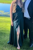 The chest was a little big for my flat-chested body so I ordered a size down (I'm usually a large, ordered a medium) and that worked well. I ended up pinning the top so that my bra wasn't showing all night. Overall absolutely LOVED the dress - Megan O.