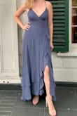 Bought this for a late summer wedding in Seattle and I felt fantastic in it. The color is lovely and I didn't feel overdressed for a cocktail/semi-formal wedding in it. There is a LOT of fabric though which made it hard to travel with it without getting wrinkled, and in 4-inch heels, there was a bit of train in the back. But I know I'll get some good use out of this dress and the lace-up back is so pretty. - Claire D.