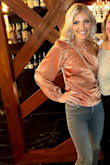 This is a great top for the fall, the color is beautiful and it is very comfortable. I just wish that the bust area wasn't so big. I had to safety pin it to my bra to keep it from falling down. - Monika T.