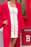 Wore this for graduation and it was great. It was tighter in the chest and  looser over my stomach area which is exactly what I wanted. The tie straps are great too because it lets you decide where you want it to hit. I'm tall and this dress was an appropriate length for me. - Elizabeth A.