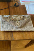 Bought this bag to accent my mother of the bride dress and it was good quality and totally perfect. It was large enough to carry my phone (most evening bags are too small), and I got several complements from my daughter's friends (even one who is a professional model!). I highly recommend this bag. - Michelle W.