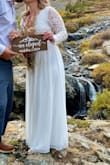 This was the most beautiful elopement dress. Going down a size to Small was definitely the better fitting size but it was a tad tight in the waist. I also ordered a Medium (my normal size) and it was really loose everywhere so I just went with the small and all I needed was to get it hemmed.
I received so many compliments and I loved it so much. Who can beat a $88 dollar wedding dress?! This also would be great for a pre-wedding event as well. - Jamie H.