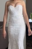 I love this dress. It is exactly what I was looking for. I needed something classy and simple for my backyard wedding and I'm so glad I found it. The only thing is that it was super long, but I expected it to be since I'm super short lol ..but other than that, It fit perfectly. - Caroline C.