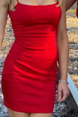 The dress fits fine, but the style could use some improvements. When I wore it, I had to constantly go to the bathroom to fix the slip, which was riding up all the way to my hips when I would walk underneath the dress. I also think the dress should have adjustable straps. - Patricia G.