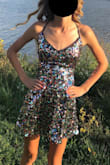 This dress is stunning! My daughter is tiny and it was nice to be able to pull the ties tight. In doing so I would say the only issue is the tiny gap that it creates at the low back but not enough to be indecent. The length was perfect and it fits great for a smaller chest. Great quality and she loved this dress! - Erica P.